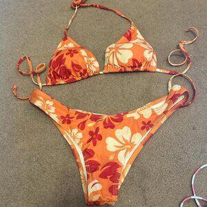 Orange hibiscus bikini set. Fits a S/M